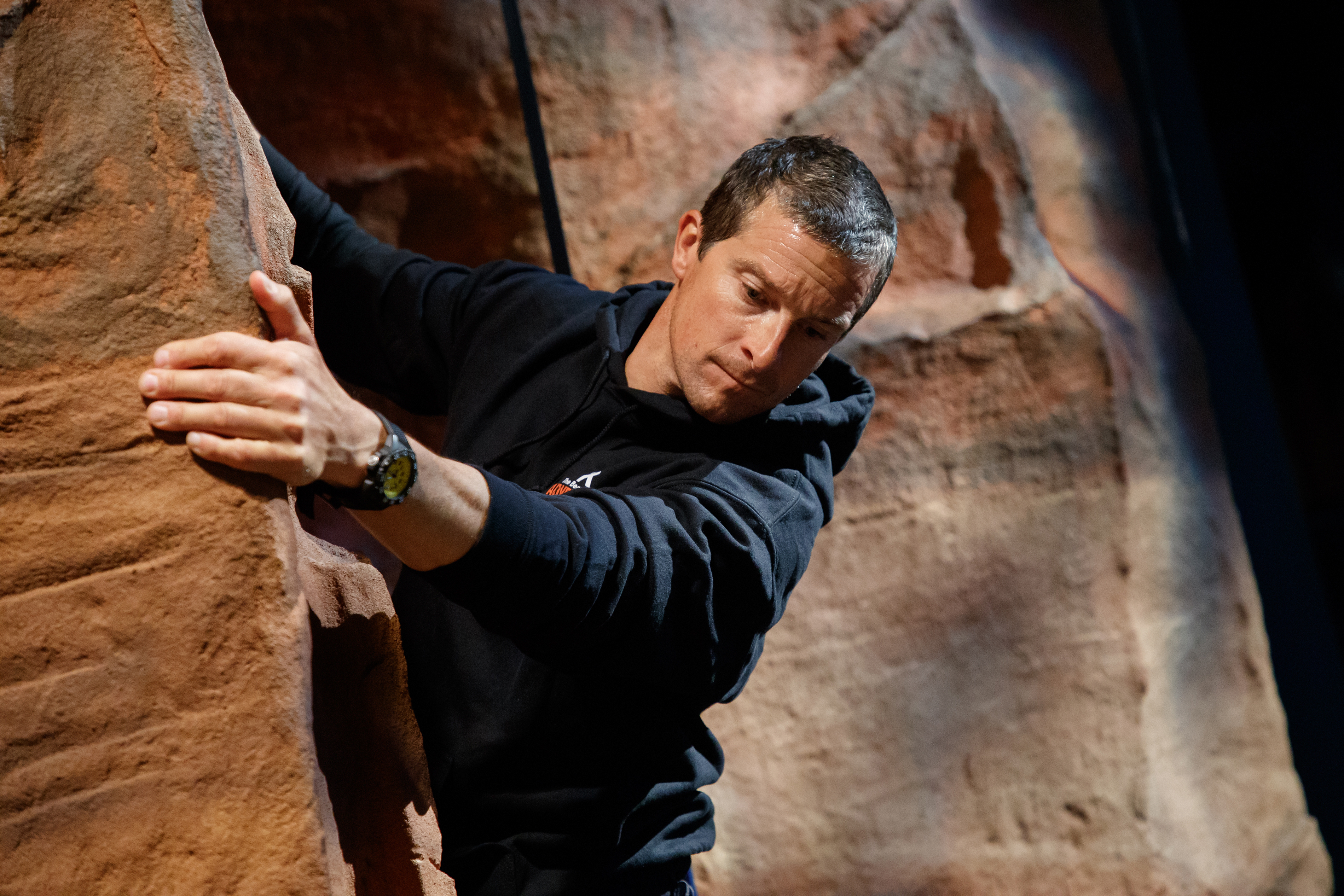 Bear Grylls Birmingham. Bear Grylls rock climbing on realistic looking rock climbing walls