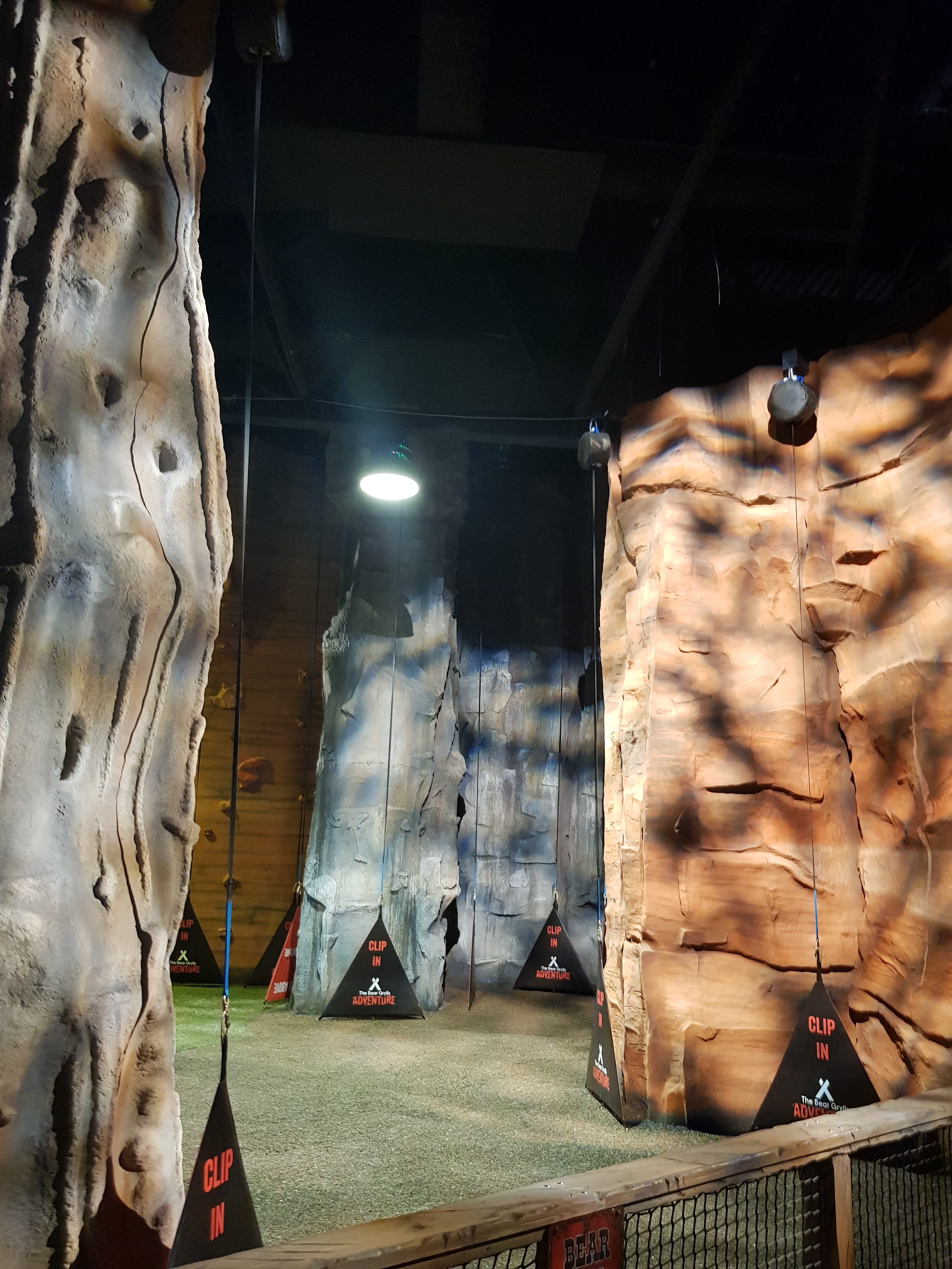 Adrenaline Rush Activities. Some of the more difficult climbing walls designed to look like real rock faces with bumbs and ridges in brown and grey colours.