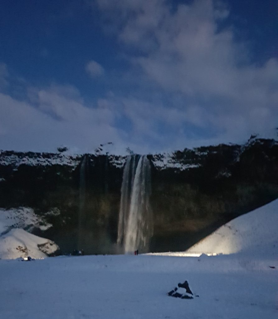 Seljalandsfoss waterfall in the evening as it is getting dark