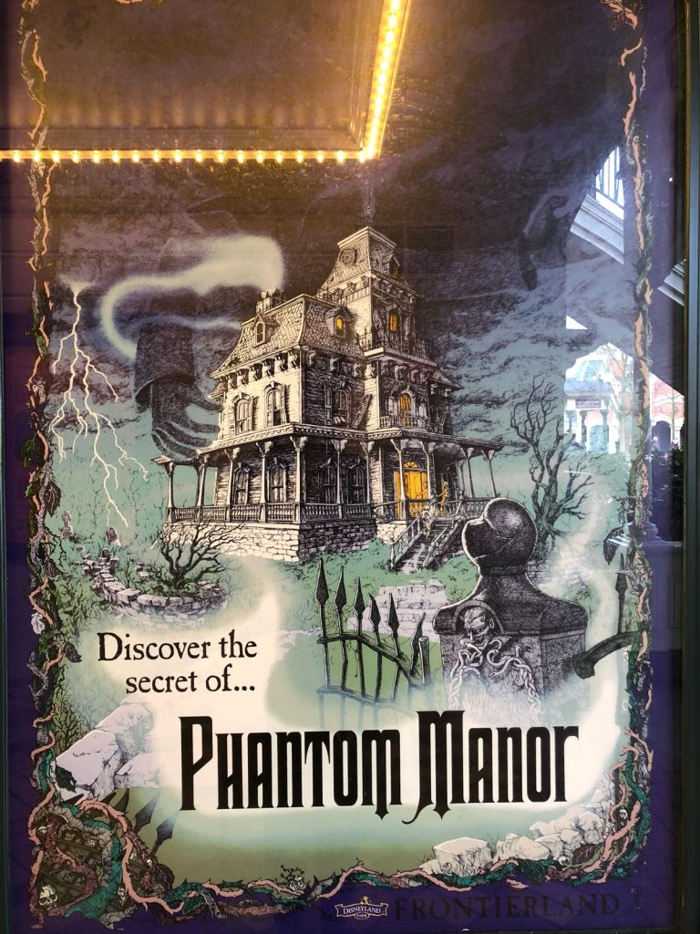 Vintage poster of Phantom Manor with a picture of a spooky looking manor house