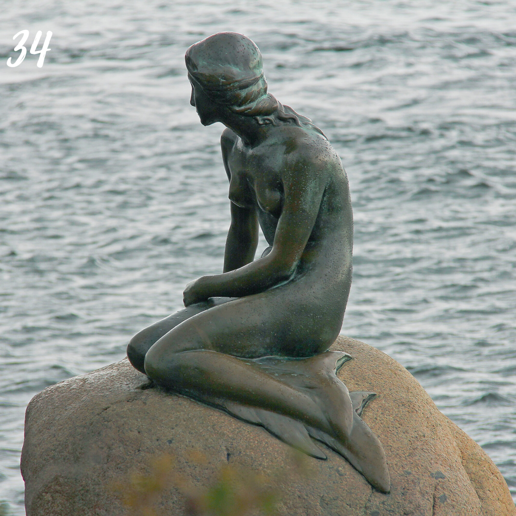 Number 34. The little mermaid bronze statue of a mermaid on a rock.